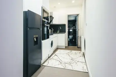 Cuisine ou kitchenette dans l'établissement La cachette romantique