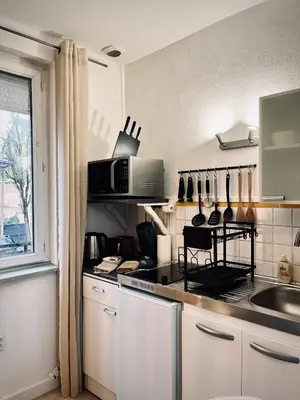 Cuisine ou kitchenette dans l'établissement La Mienn'oise