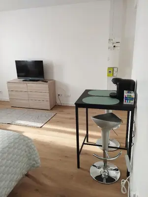 Télévision ou salle de divertissement dans l'établissement Appartement Cosy proche de Rouen