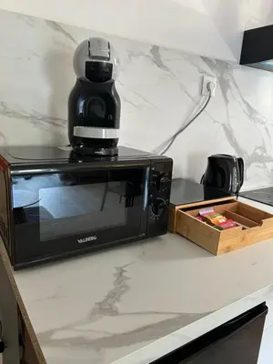 Cuisine ou kitchenette dans l'établissement Le Presbytère secret - Centre & Gare à pied