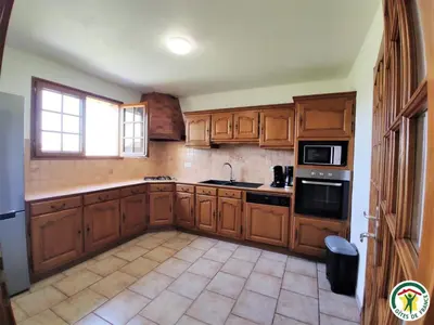 Cuisine ou kitchenette dans l'établissement Le gite du village