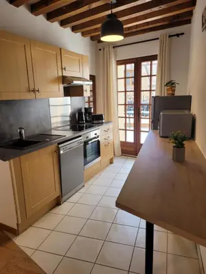 Cuisine ou kitchenette dans l'établissement Les Reinettes