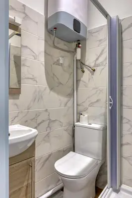 Salle de bains dans l'établissement L'Écrin Normand un studio au cœur de Rouen