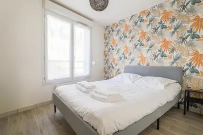 Un ou plusieurs lits dans un hébergement de l'établissement Cosy en centre ville