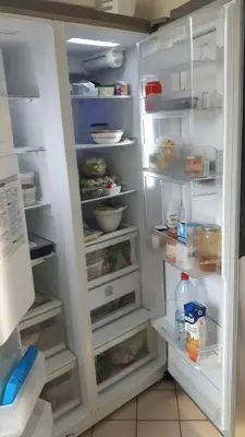 Cuisine ou kitchenette dans l'établissement Appartement lumineux à 20mn de Paris en RER A