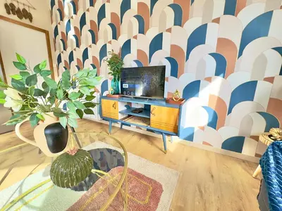 Télévision ou salle de divertissement dans l'établissement T2 Cosy Centre Ville Amiens - Rez-de-chaussée
