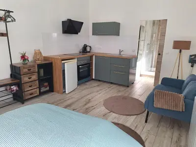 Cuisine ou kitchenette dans l'établissement La maison du bout d en haut
