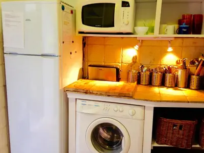 Cuisine ou kitchenette dans l'établissement maison week end vacances 1H Paris Ouest