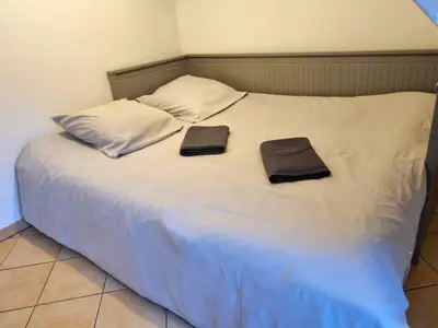 Un ou plusieurs lits dans un hébergement de l'établissement Pacy sur Eure loft en plein centre
