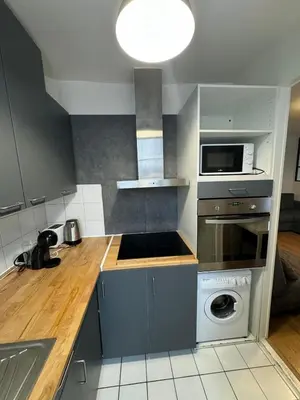 Cuisine ou kitchenette dans l'établissement Logement au pied de la gare