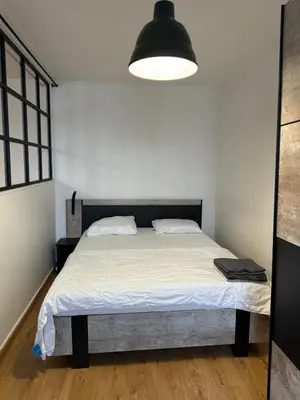 Un ou plusieurs lits dans un hébergement de l'établissement Logement au pied de la gare