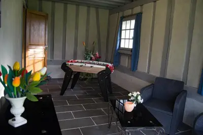 Coin salon dans l'établissement La chaumière de l'épine - Maison paisible entre forêts & plages