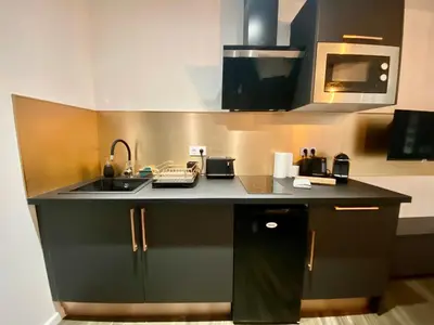 Cuisine ou kitchenette dans l'établissement Escapade Détente avec Balnéo -043