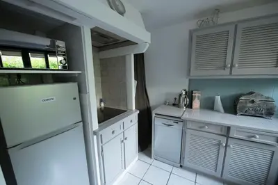 Cuisine ou kitchenette dans l'établissement La maison du 1, Vexin