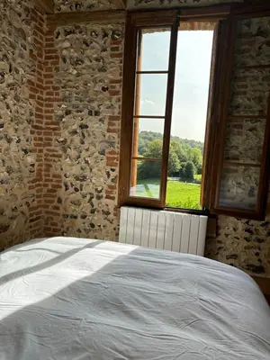 Un ou plusieurs lits dans un hébergement de l'établissement Évasion Champêtre avec Jacuzzi Havre de Paix en Normandie