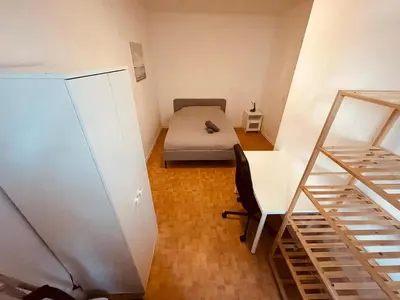 Un ou plusieurs lits dans un hébergement de l'établissement Nuit sous le Clocher - 374
