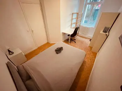 Un ou plusieurs lits dans un hébergement de l'établissement Nuit sous le Clocher - 374