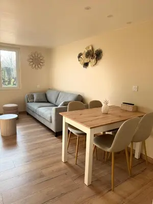 Coin salon dans l'établissement Gîte au cœur de la nature