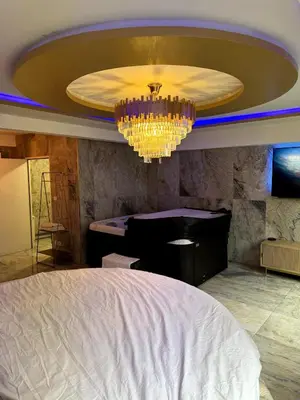 Télévision ou salle de divertissement dans l'établissement Golden house 2 - Jacuzzi