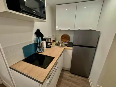 Cuisine ou kitchenette dans l'établissement Joyeuse Escale à la Gare - 368