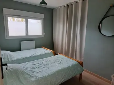 Un ou plusieurs lits dans un hébergement de l'établissement Gîte Axel'Air