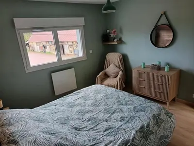 Un ou plusieurs lits dans un hébergement de l'établissement Gîte Axel'Air