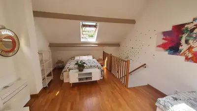 Un ou plusieurs lits dans un hébergement de l'établissement Gîte des Bruyères à Coye-la-Forêt