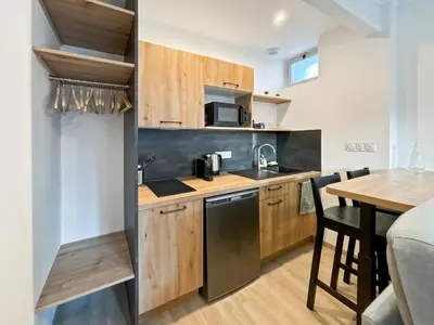 Cuisine ou kitchenette dans l'établissement Studio Douceur Marine
