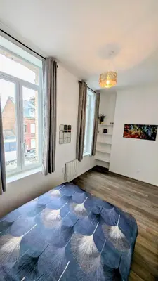 Un ou plusieurs lits dans un hébergement de l'établissement L'haussmannien 1er Étage