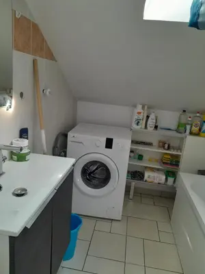 Cuisine ou kitchenette dans l'établissement Chambre Privée