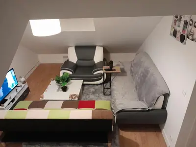 Coin salon dans l'établissement Chambre Privée