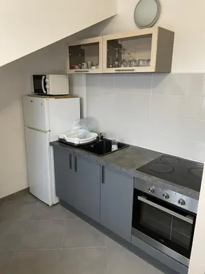 Cuisine ou kitchenette dans l'établissement Floor of a house apartment F3