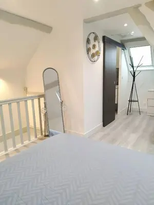 Un ou plusieurs lits dans un hébergement de l'établissement La petite maison