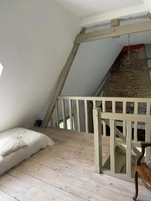 Un ou plusieurs lits dans un hébergement de l'établissement Maison Juliette