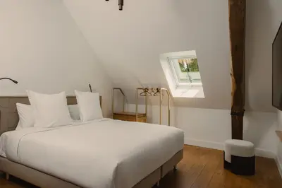 Un ou plusieurs lits dans un hébergement de l'établissement Le Clos des Martines, Maison d'exception