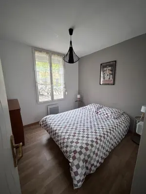 Un ou plusieurs lits dans un hébergement de l'établissement Villa Juliette