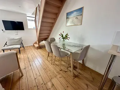 Télévision ou salle de divertissement dans l'établissement Le Duplex Appartement