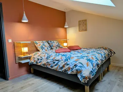 Un ou plusieurs lits dans un hébergement de l'établissement Le cottage du moulin - NETFLIX - WiFi - Garage