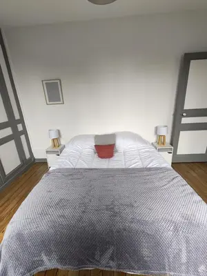 Un ou plusieurs lits dans un hébergement de l'établissement Maison en briques au 10