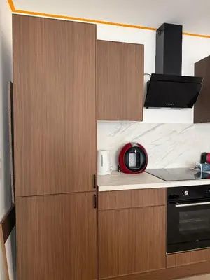 Cuisine ou kitchenette dans l'établissement Cozy et élégant à 2 minutes de la Gare de Persan
