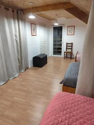 Un ou plusieurs lits dans un hébergement de l'établissement Gîte Les Marettes