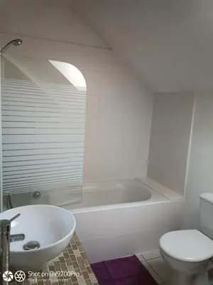 Salle de bains dans l'établissement Cottage Les Quatre Saisons