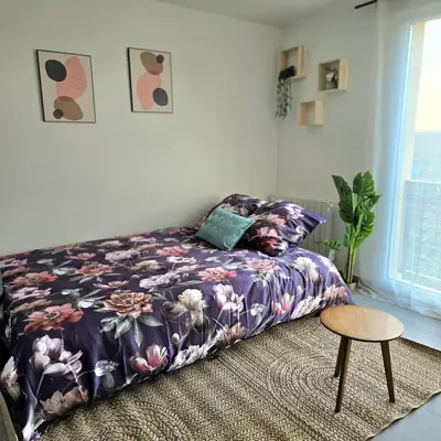 Un ou plusieurs lits dans un hébergement de l'établissement Urban Zen - Freneuse