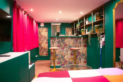 Un ou plusieurs lits dans un hébergement de l'établissement L'Instant Boudoir - Parenthèse élégante à Rouen