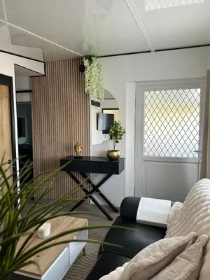 Coin salon dans l'établissement Welcome to Thai Home!