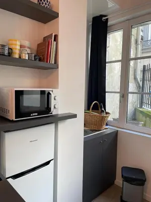 Cuisine ou kitchenette dans l'établissement La Petite Jeannette Studio