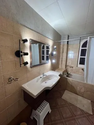 Salle de bains dans l'établissement La Parenthèse en bord de seine