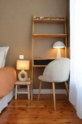 Un ou plusieurs lits dans un hébergement de l'établissement Les Chambres du 32
