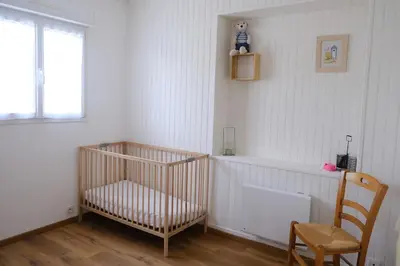 Un ou plusieurs lits dans un hébergement de l'établissement Evasion Marine, Cozy home
