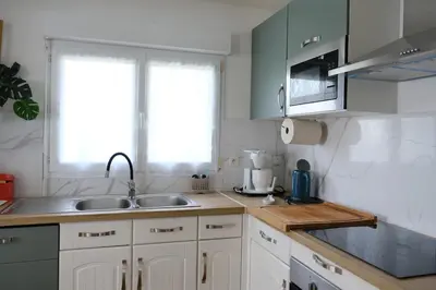 Cuisine ou kitchenette dans l'établissement Evasion Marine, Cozy home